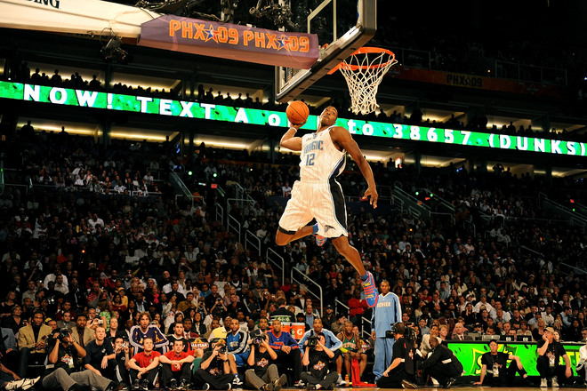 Orlando Magic center Dwight Howard dunks in the 2009 Sprite Slam Dunk contest at NBA All-Star Weekend after lobbing the ball off the right side of the backboard.