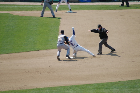 Ryan Theriot slides in safely after doubling