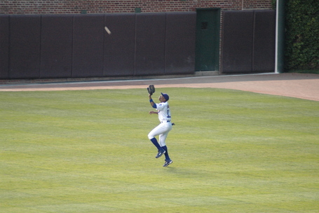 Soriano catching an Atkins fly ball